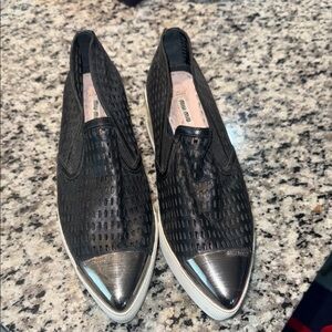 Miu Miu Black Perforated Leather Slip-On Sneakers with Silver Metallic Toe
